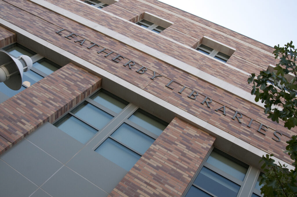 Exterior photo of the front of the Leatherby Libraries, taken at an extreme angle.
