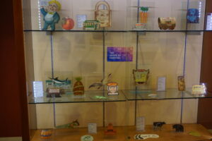 A large display case with die-cut papers.
