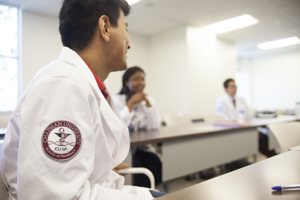 Chapman University School of Pharmacy students attentively learn in the classroom.