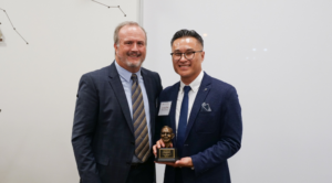 Dr. Ken Thai and Dean Ostrom with the Gavin Herbert Award
