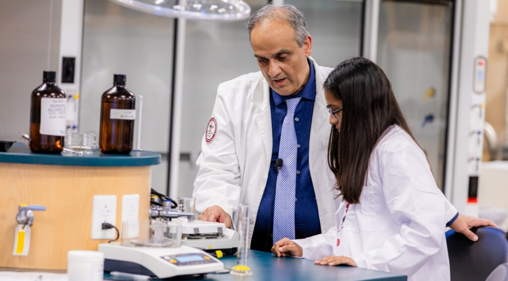 Professor and student in a pharmacy classroom