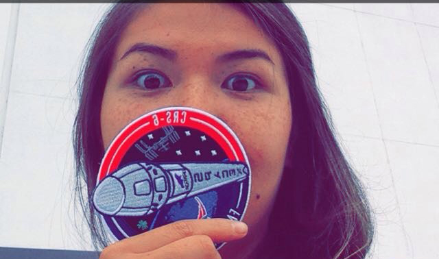 Taylor Krause with a NASA Patch
