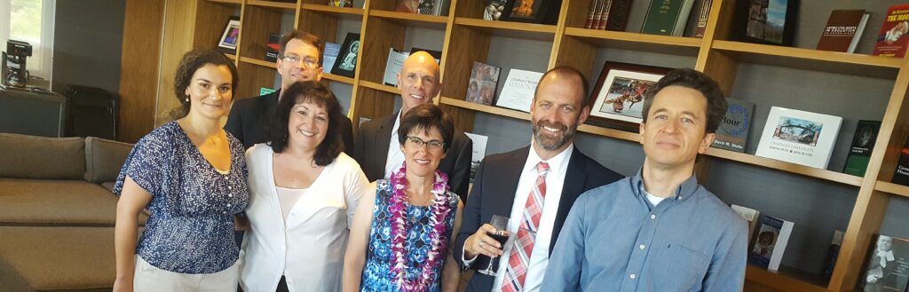 Schmid College faculty celebrate after being recognized at the 2016 Faculty Honors Convocation on May 13, 2016.