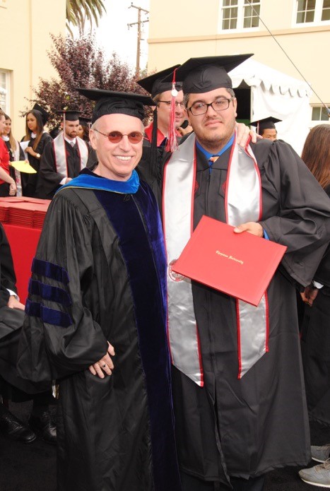 Leonardo with his father, Dr. Georg Eifert, at his graduation ceremony in May 2014.