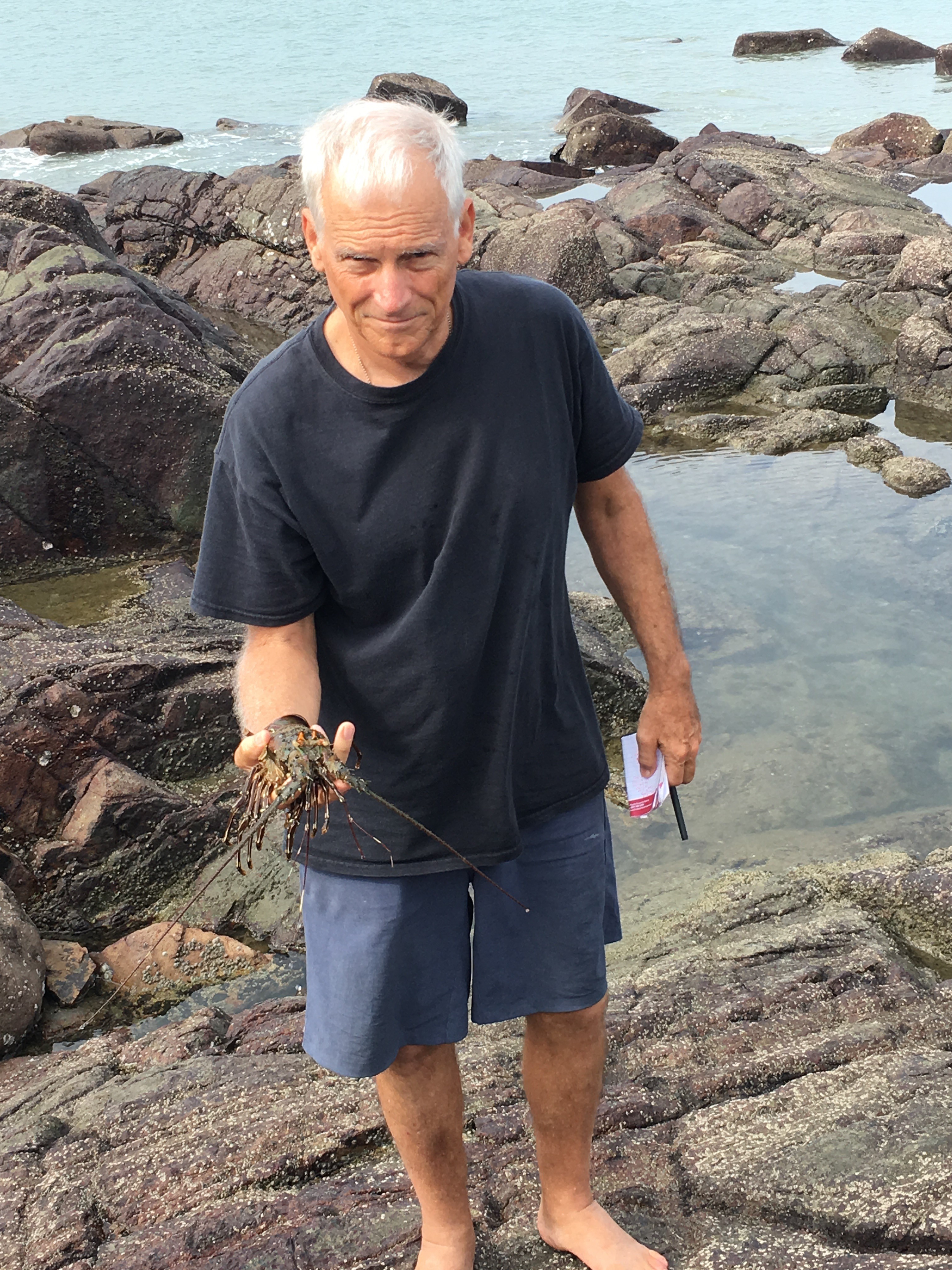 Dr. Wright with a lobster carcass. We expected to see crustaceans predate on Dolabrifera.