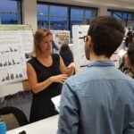 Jennifer Funk talks to students about her research on invasive and non-invasive plants.