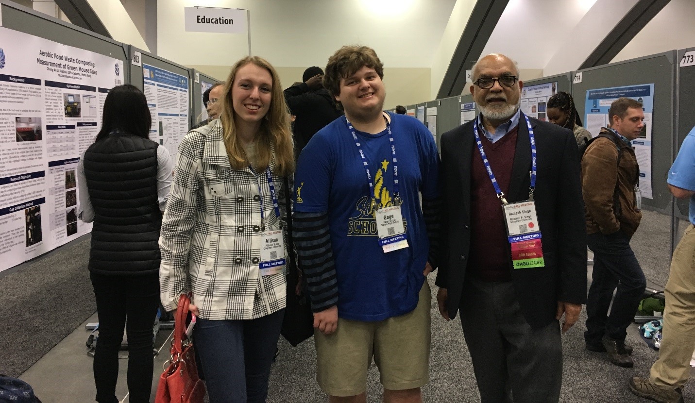Gage Kizzar (center) with Prof. Ramesh Singh (right) and environmental science and policy major Allison Scavo ’17 (left) in the poster hall at the American Geophysical Union (AGU) Fall 2016 Meting.