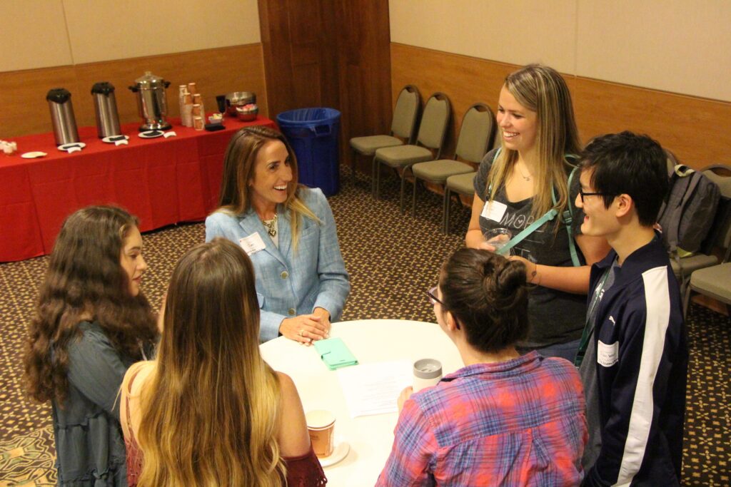 Chapman's Director of PR Sheri Ledbetter talks with GCI students.