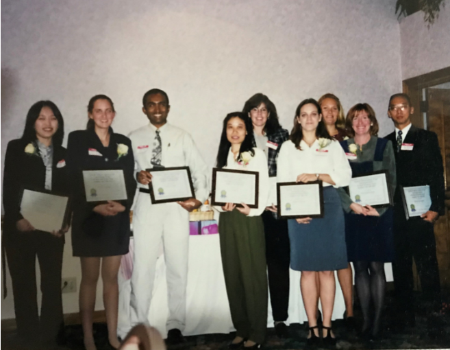 Suresh De Costa receiving scholarship