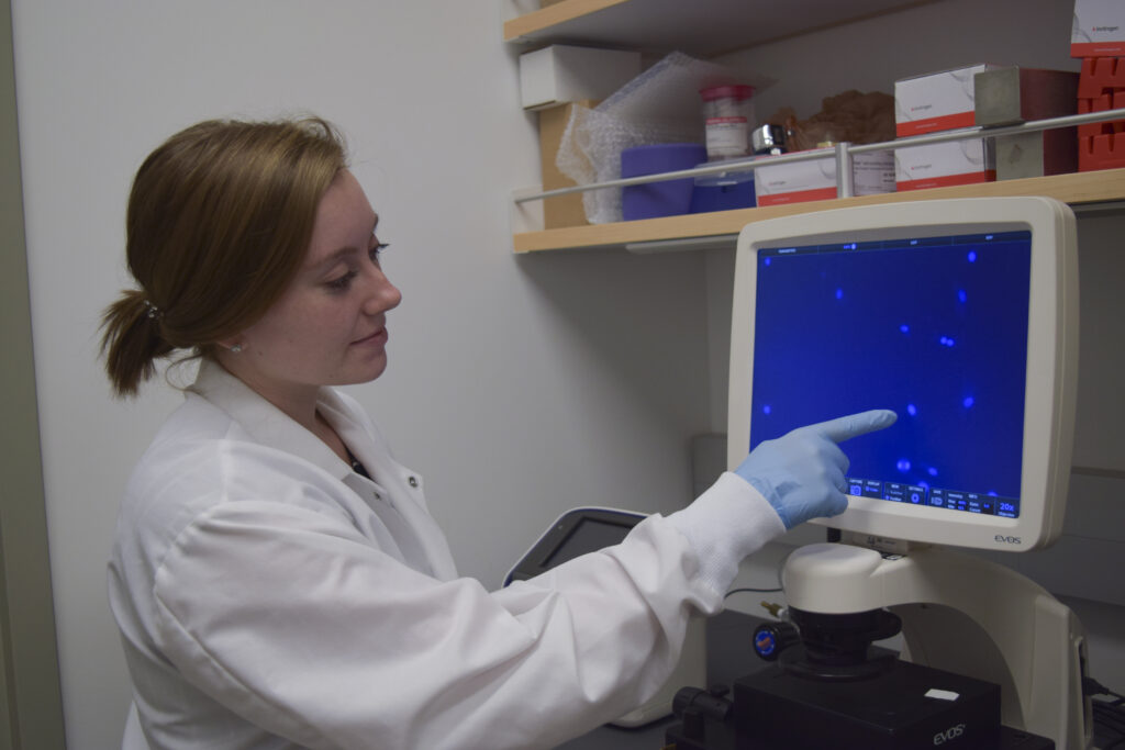 student in research lab