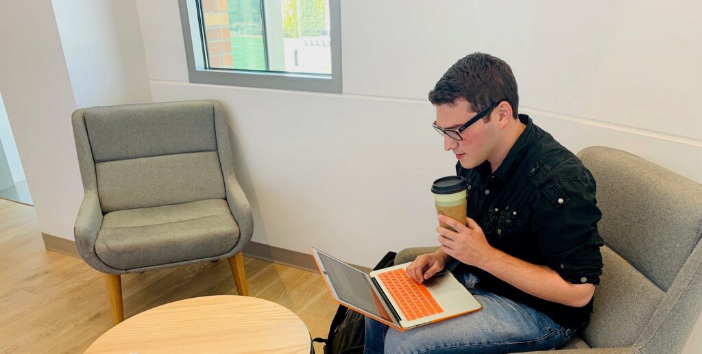 Joshua Goldfaden studying in Keck Center