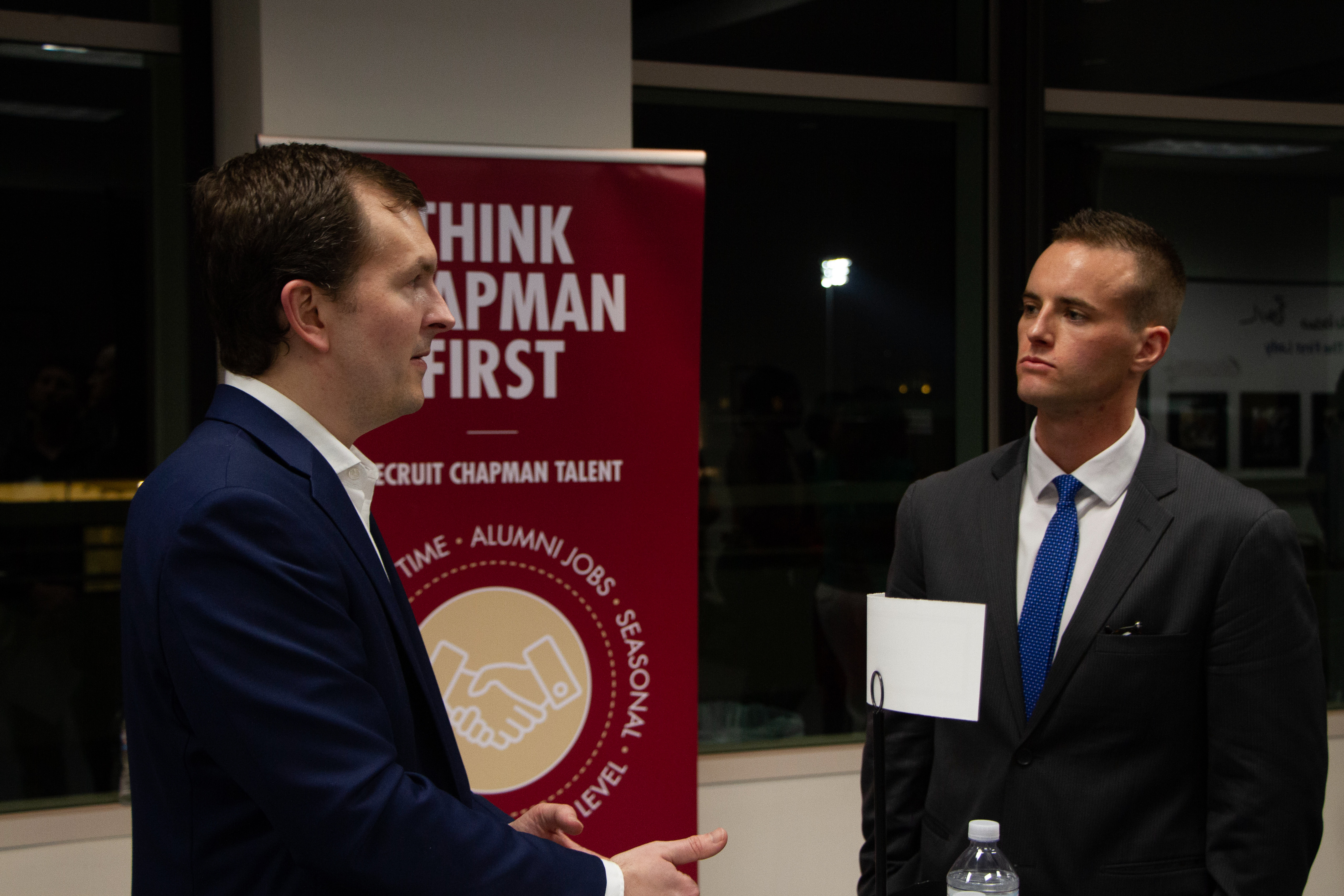 student networking with employer