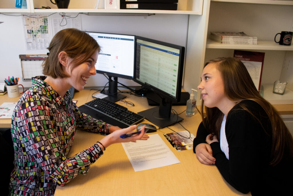 career educator Leanna Izen meeting with a student