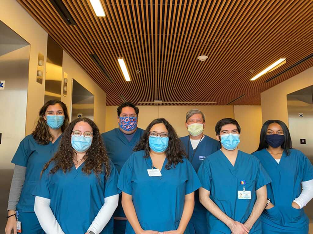 Rosita Saul with her work team