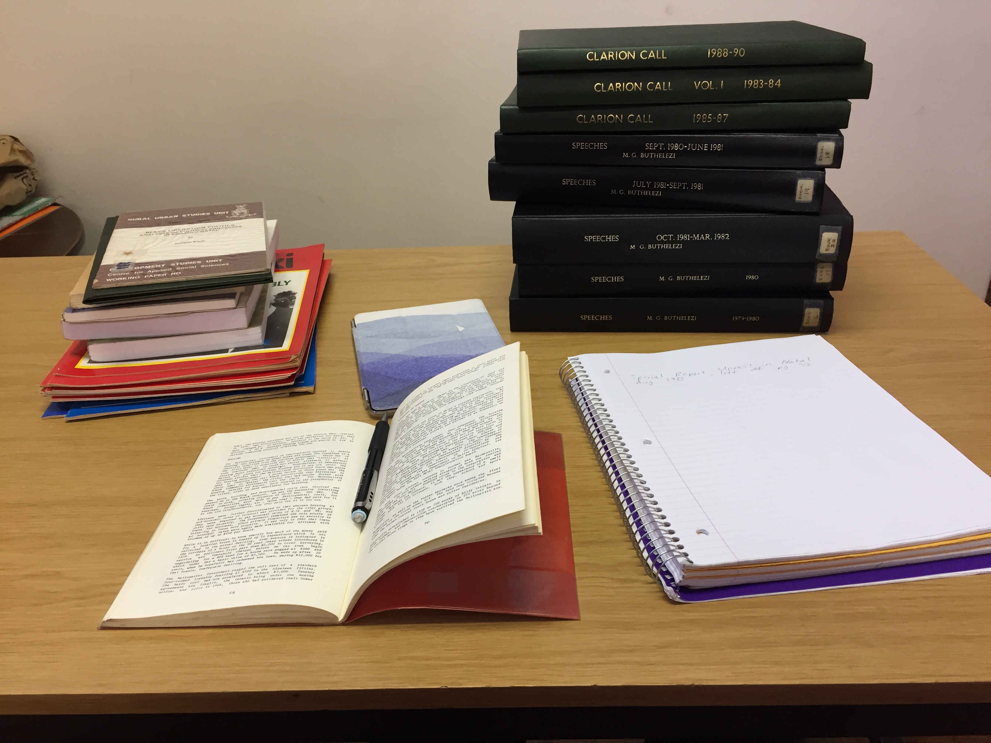 MacInnes' desk in Durban, South Africa, at the Killie Campbell Africana Library - lots of books out for archival research