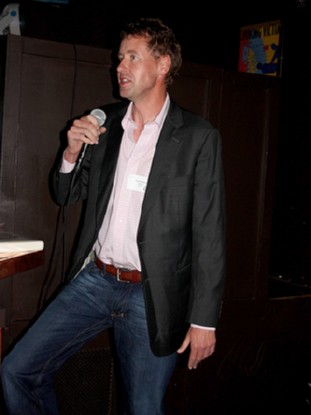 Man speaking into microphone.