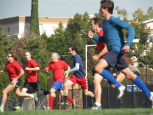 People playing soccer.