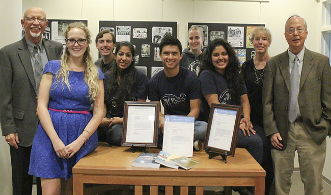 Group of people smiling.
