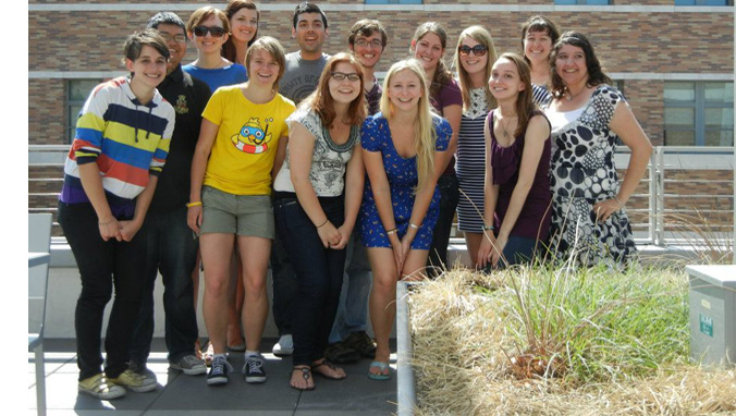 Group of people smiling.