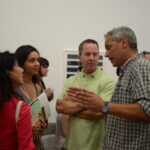 Group of people speaking.