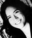Woman smiling.