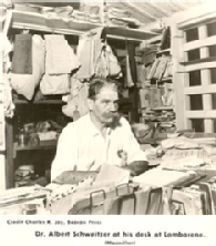 Albert Schweitzer at a desk.