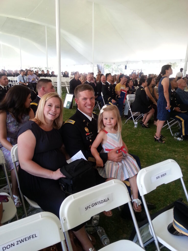 Army Lieutenant with his family.