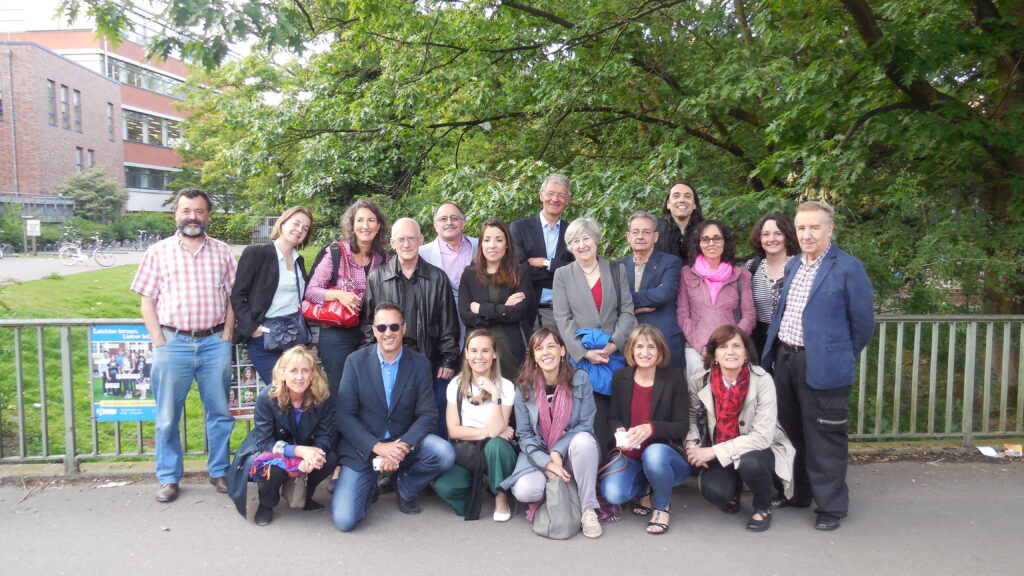 Group of people smiling.