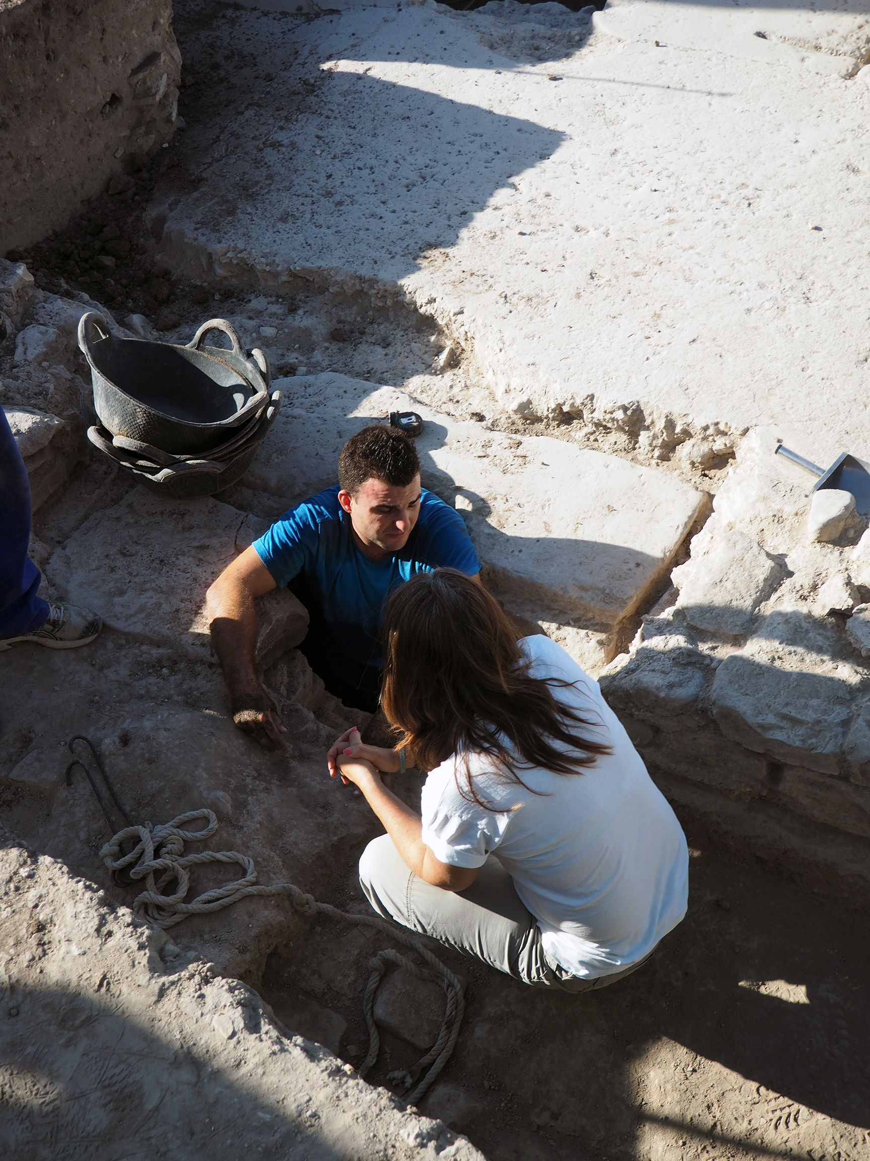 People working on dig site.