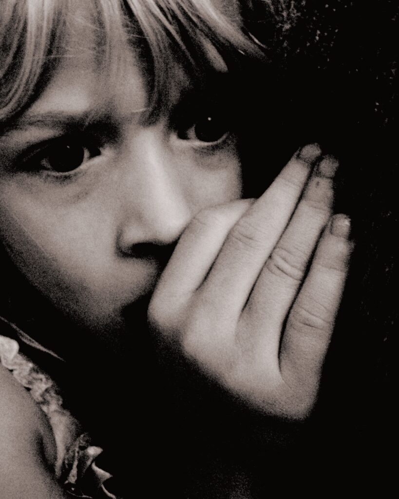 Girl hugging someone.