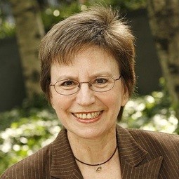 Woman smiling.