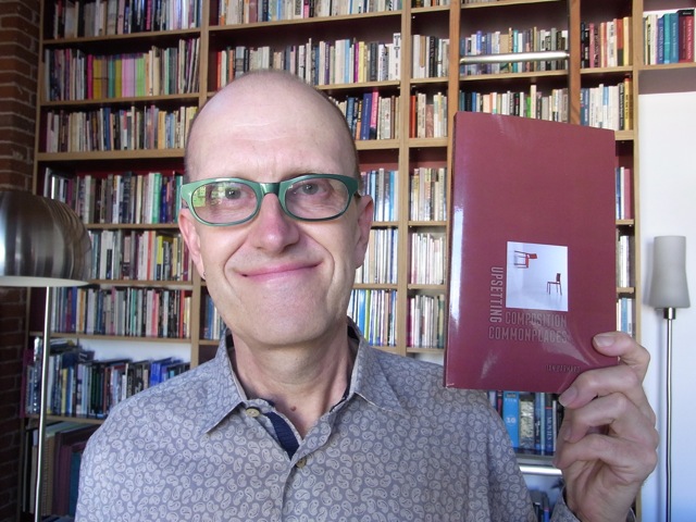 Man holding a book.