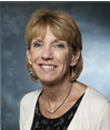 Woman smiling.