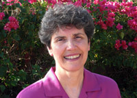 Woman smiling.