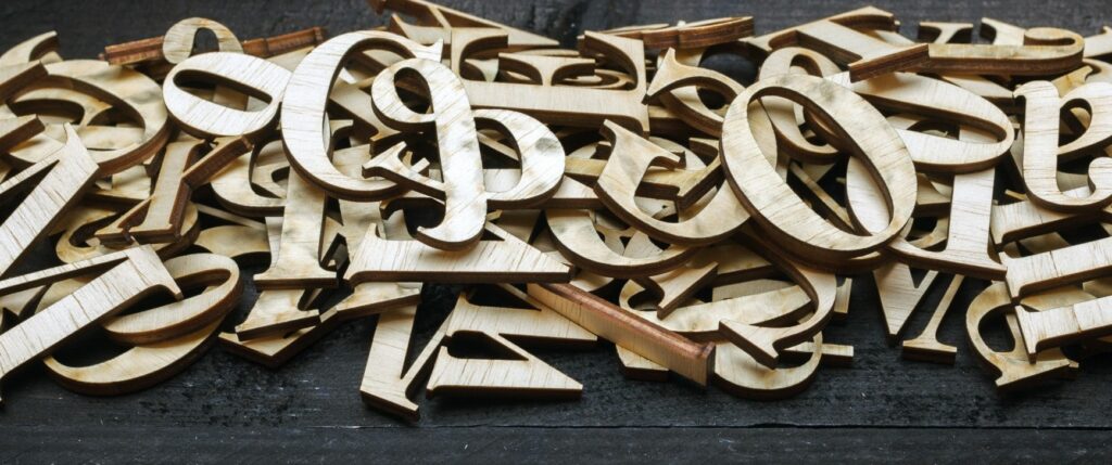 Photo of wooden letters in a pile.