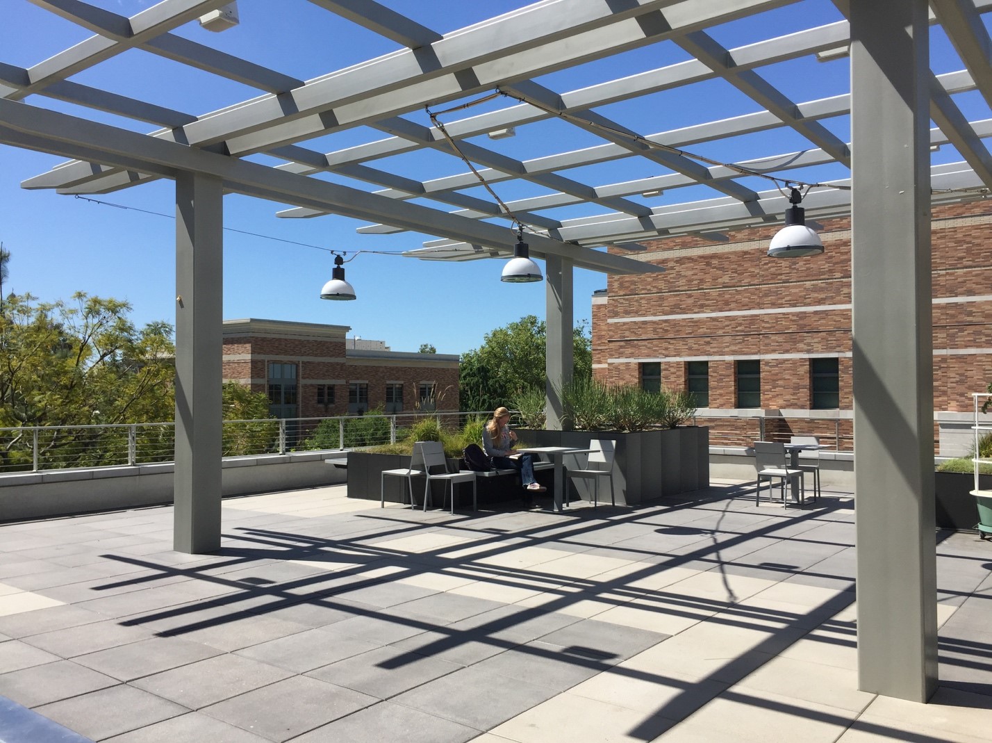 Outdoor area with chairs and tables.