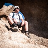 Hiker sitting on rock