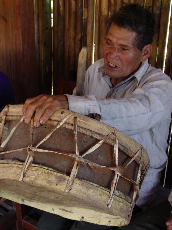 man with tribal drum