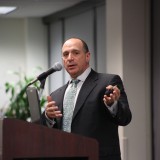 Eric Brandt speaks to the Argyros School community.