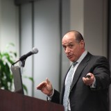 Eric Brandt speaking to the audience.