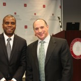 Argyros School Dean Reggie Gilyard and businessman Eric Brandt.