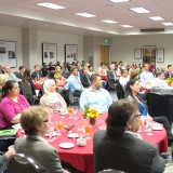 Students, staff, faculty and donors listen to what Eric Brandt has to say.
