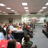 Students, staff, faculty and donors listen to what Eric Brandt has to say.