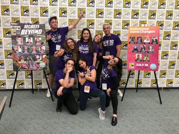 group of smiling young adults at ComicCon