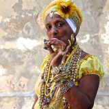 Lady smoking a cigar.