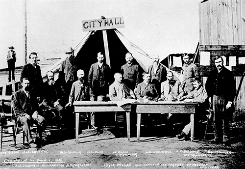Historical photo of group of men outside City Hall tent