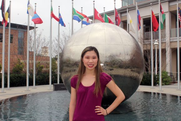 Student in front of Global Citizens Plaza