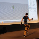 The motion capture software (onscreen) captures every movement he makes, in real time.