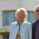 Image of building founder Marion Knott and Dean Bob Bassett in front of Marion Knott Studios during the building phase.