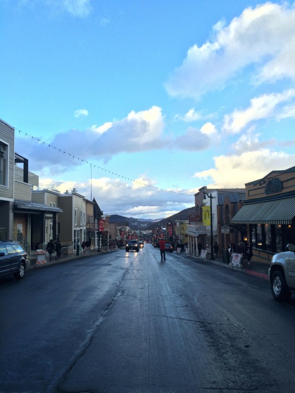 street with a blue sky behind it
